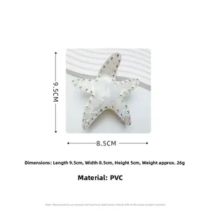 Detailed view of iridescent starfish hair claw clip with rhinestones and size dimensions