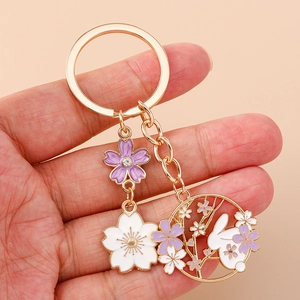 Exquisite cherry blossom and bunny metal keychain with purple floral enamel pendants