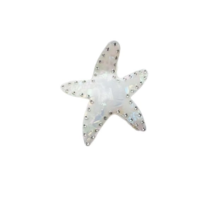 Elegant starfish hair claw clip with pearlescent finish and sparkling rhinestone edges