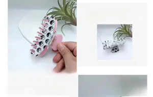 Detail of Yin-Yang pattern hair claw clip with pink inner layer and strong gold spring
