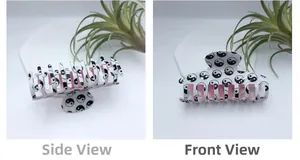 Detailed side and front views of a large white hair claw clip with Tai Chi pattern