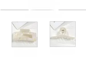 Detail view of rectangular hollow and cross ribbon iridescent pearlescent hair claw clips