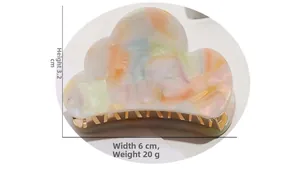 Cloud-shaped acetate hair claw with pearlescent pastel finish, size 6cm by 3.2cm