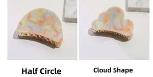 Detail of semi-circular and cloud-shaped acetate hair claws in macaron colors
