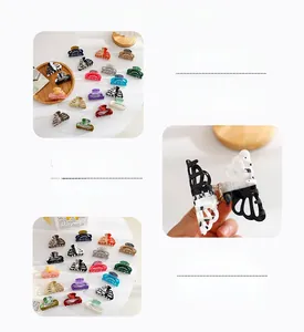 Detailed close-up showing the interior spring and marble patterns on hair claw clips