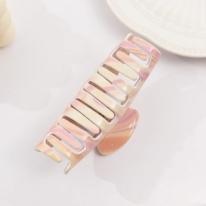 Elegant marble butterfly hair claw clip with cream and pink resin texture for women