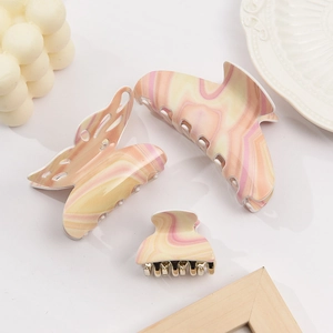 Elegant butterfly hair claw set with pastel marble texture and glossy acetate finish