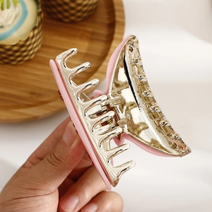 French minimalist cherry rhinestone hair claw clip in matte pink with gold metal teeth