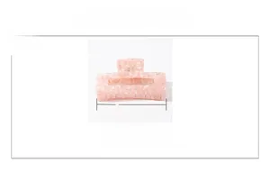 Detail showing pink marble hair claw clip with 10cm measurement guide and spring mechanism