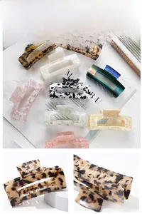 Detailed macro view of high-quality resin hair claw clips showing durable spring tension