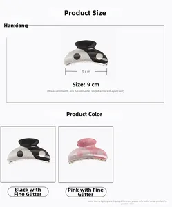 Detailed view of 9cm Yin Yang acrylic hair claws with glitter finish in black and pink