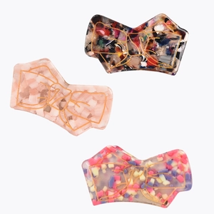 Japanese style acetate bow hair clips in three floral and marble patterns for women