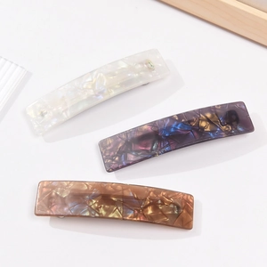 Rectangle acrylic hair clip set with marble texture in white, blue, and amber colors