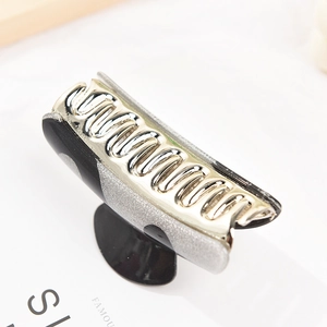 Yin Yang hair claw clip with black and glitter silver finish for women's hairstyles