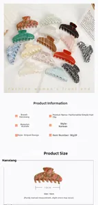 Detailed close-up of 10cm acetate hair claw clips with elegant marble patterns