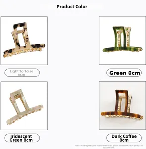 Detail view showing four colors of 8cm acetate hair clips with gold metal springs
