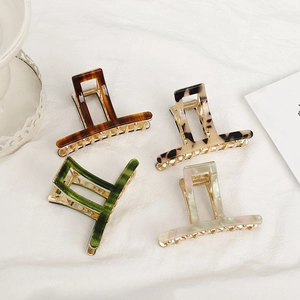 French minimalist acetate hair claw clips set in tortoise shell and pearlescent colors