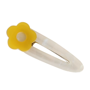 Detail of yellow flower acetate hair clip with pearlescent waterdrop base for women