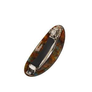 Elegant tortoise shell acetate hair clip with blue spots and silver metal spring