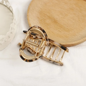 Elegante pinza per capelli in metallo dorato con motivo tartarugato per capelli folti