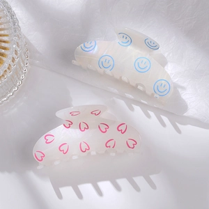 Pinces à cheveux en acrylique aux finitions nacrées irisées et motifs colorés