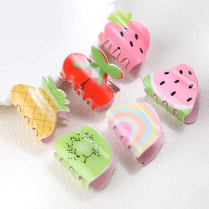 Cute acrylic fruit hair clips set featuring strawberry and pineapple designs for girls