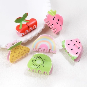 Cute Korean acrylic fruit hair claws featuring strawberry pineapple and rainbow designs