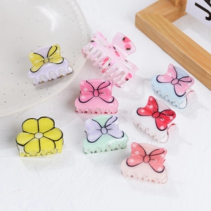 Colorful acrylic bow and flower hair claws set for women with glitter finish