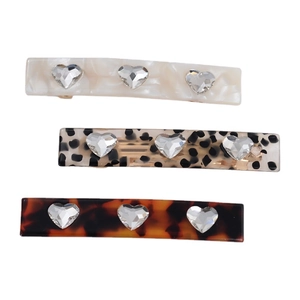 Three-piece acetate hair clip set with sparkling heart rhinestones in marbled patterns
