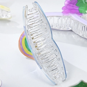 Translucent blue acrylic hair claw clip with large multi-tooth grip for thick hair styles