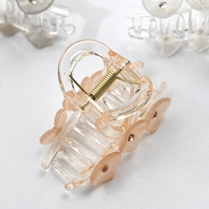 Elegante pinza per capelli a cuore trasparente con strass e molla in metallo oro