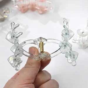 Elegante pinza per capelli a cuore trasparente con molla dorata per acconciature folte