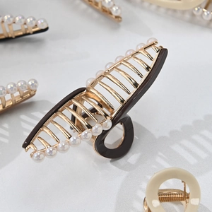 Pinces à cheveux élégantes en métal doré avec perles et design ruban pour femmes