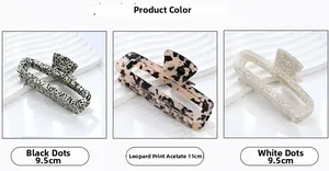 Detail of square acetate hair claws in leopard print and polka dot patterns