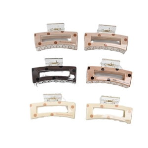 Set of six polka dot acetate hair claw clips in earth tones with rectangle geometric design