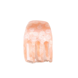 Pink acetate hair claw clip with white smiley face patterns for elegant hair styling