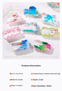 Détail de pinces à cheveux en acrylique avec motifs lapin et chien sur fond texturé