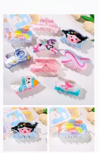 Detailed close-up showing vibrant acrylic Christmas hair clips with diverse cartoon shapes