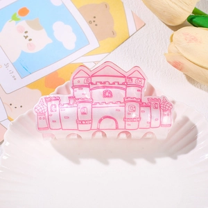Pink and white acrylic Christmas hair claw clip with castle print on seashell tray