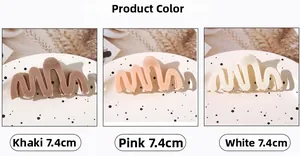 Three 7.4cm wave acetate claw clips in khaki, pink and white with metal springs