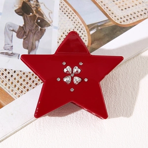 Elegant red star-shaped hair claw clip with heart-shaped rhinestones for women
