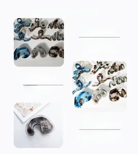 Close-up of diverse acetate hair claws featuring marble and tortoiseshell patterns