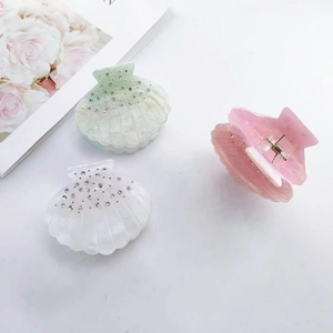 Sparkling rhinestone shell hair clips in pastel green, white and pink colors