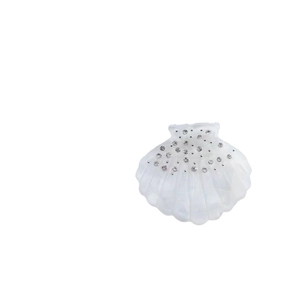 Elegant shell-shaped acetate hair claw with iridescent rhinestones in pearl white