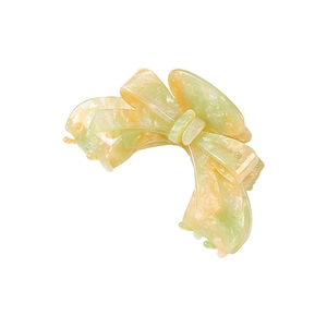 Elegant French marble acetate bow hair claw clip in soft green and orange tones