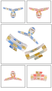 Detailed views of checkered hair claws in colorful blue, yellow, and pink striped acrylic