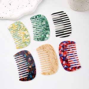 Elegant U-shaped acetate hair combs in various marble and floral patterns for women