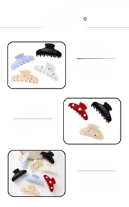 Detailed macro view of acetate hair claws with sparkling rhinestones and floral patterns