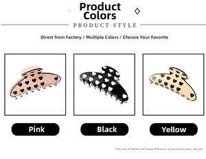 Trois pinces à cheveux en rose, noir et jaune avec des motifs de cœur minimalistes