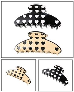 Détails des pinces à cheveux à motif cœur en noir et beige avec finition brillante